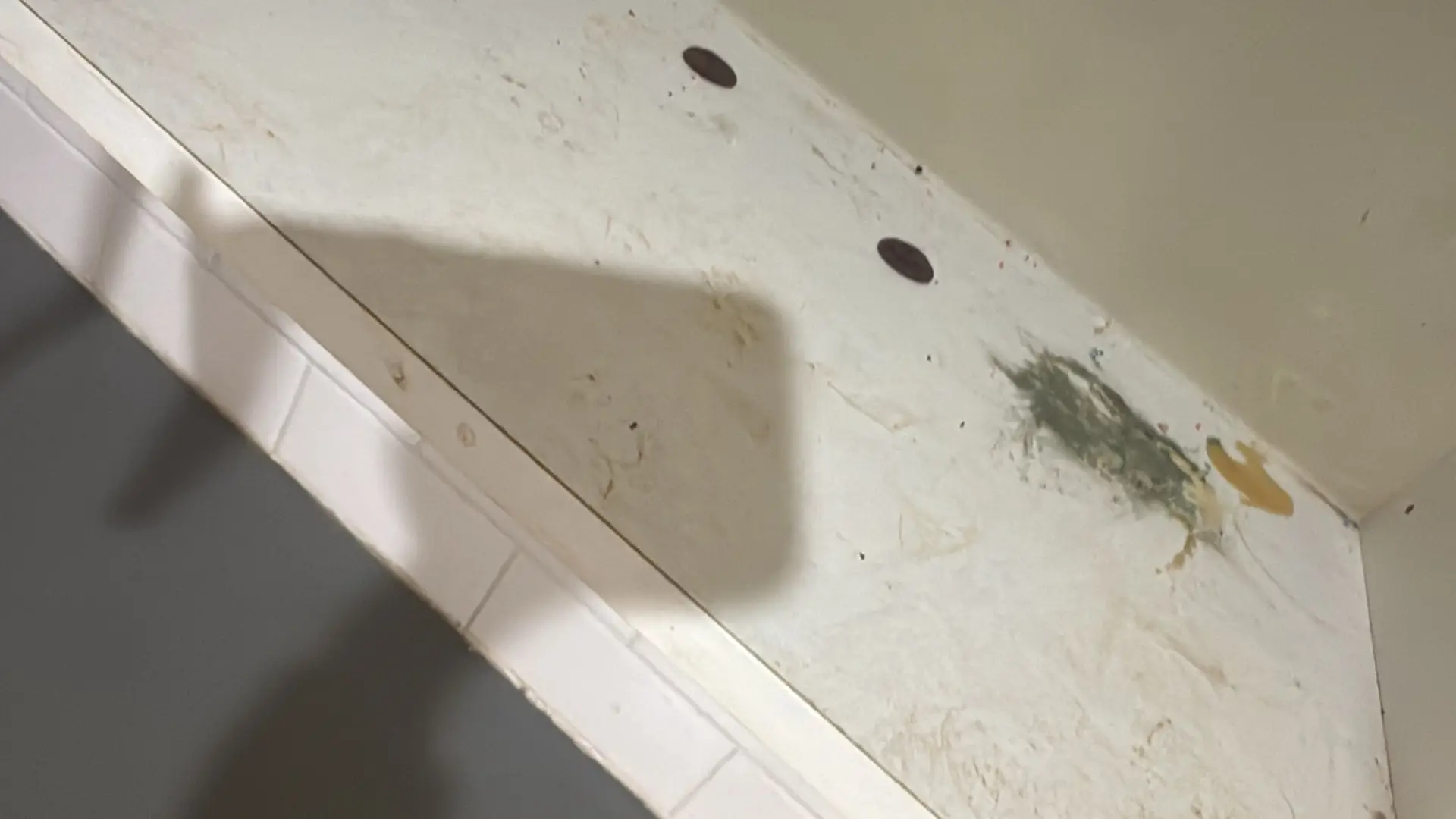 Kitchen under-sink cupboards before bond cleaning, Perth