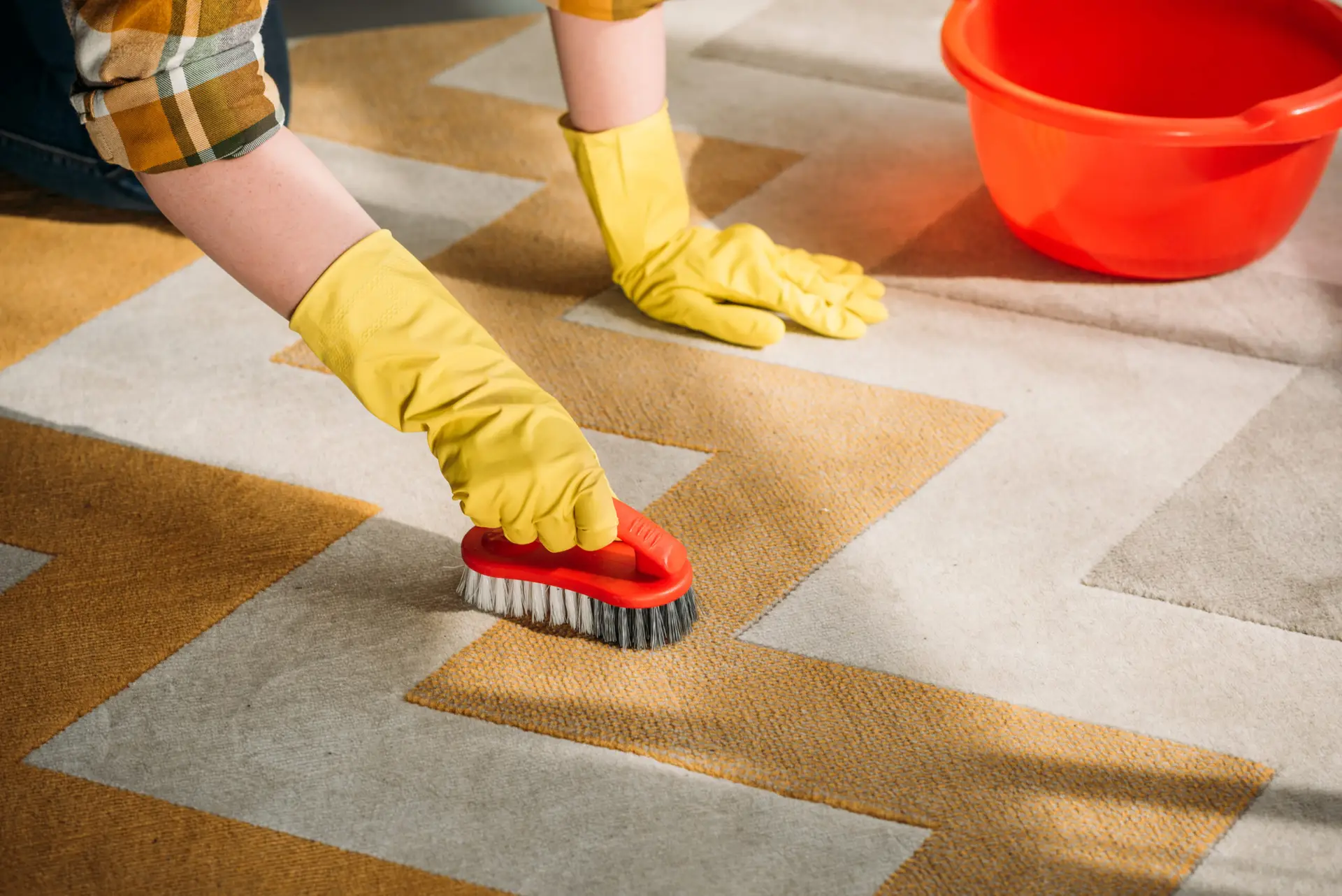 An Urgent Pro carpet cleaning provider in Melbourne positioning high-velocity air movers on freshly cleaned carpet to speed drying, with professional equipment visible in a realistic local service setting