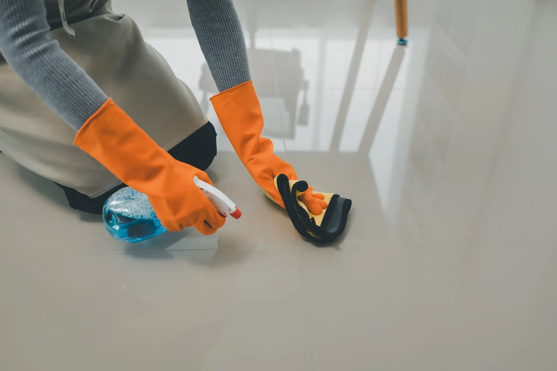 An Urgent Pro house cleaning provider in Sydney vacuuming the bedroom floor, dusting the bedside table and wiping window sills in a Sydney home bedroom, with professional equipment visible in a realistic local service setting