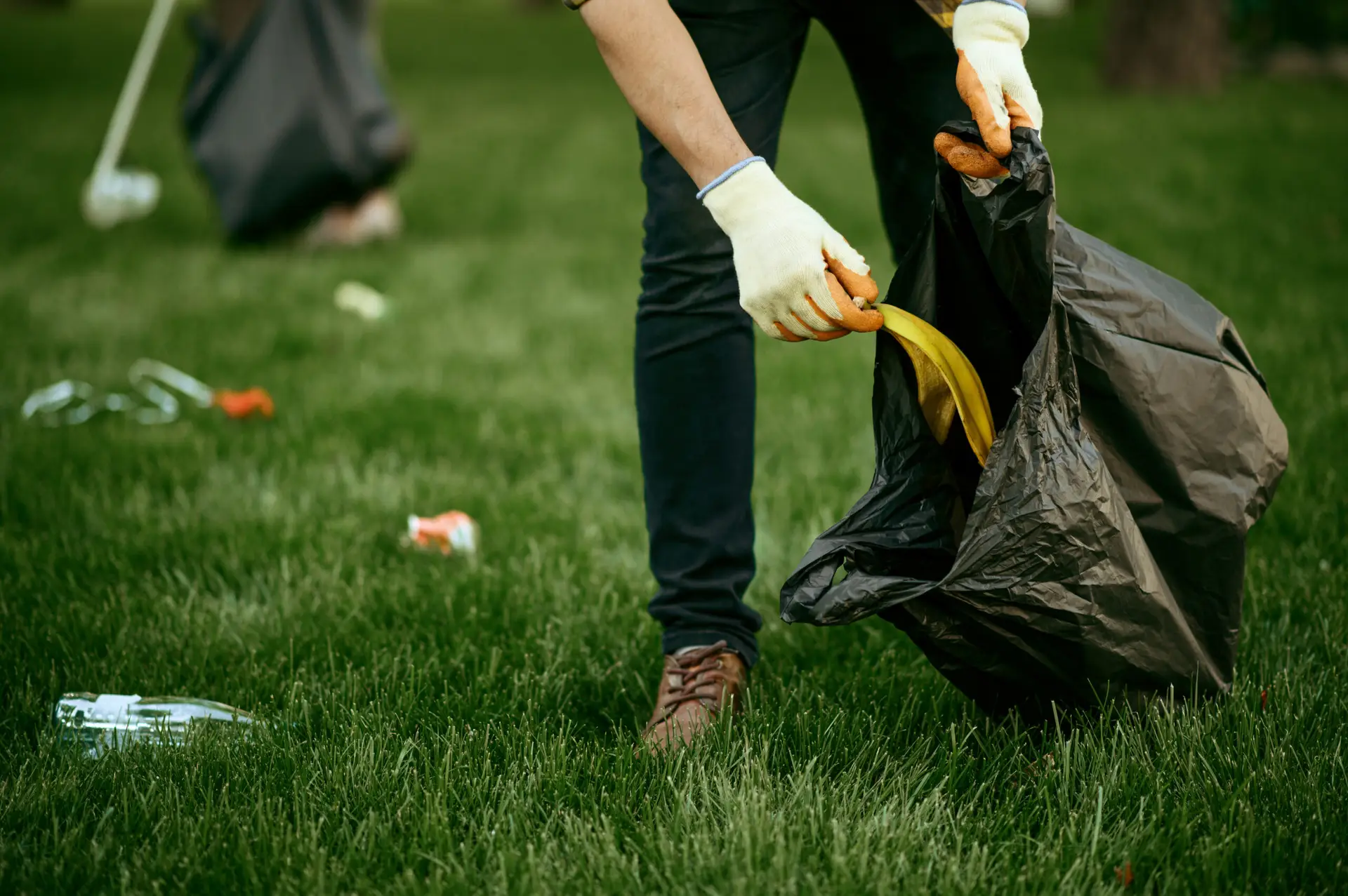 An Urgent Pro rubbish removal provider in Brisbane showing a property cleared of all old furniture and garden waste with a clean open space, with professional equipment visible in a realistic local service setting
