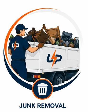 Urgent Pro junk removal worker loading old furniture and household rubbish into a white removal truck.